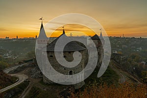 Medieval castle or stronghold silhouette and beautiful sunset