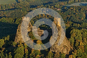 Medieval castle of Trosky on a hill in the forest. Czech Republic