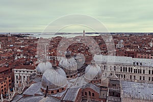 Medieval chaotic buildings in the city center around Piazza San Marco in Venice, Italy. Vintage style photo