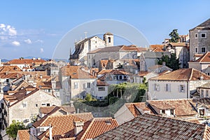 Medieval church and red tiled roofs in Dubrovnik, Croatia