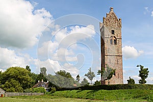 Medieval church tower with saddleback roof