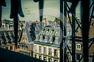 medieval city of Strasbourg France seen through wrough iron window frame
