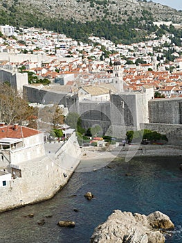 Medieval city walls and clay tiled roofs