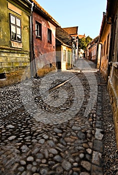 Medieval cobblestone paved road photo