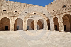 Medieval courtyard with arches in the fortress