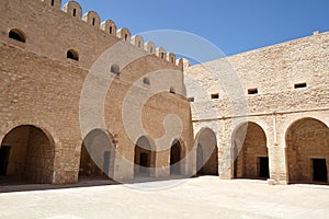 Medieval courtyard with arches in the fortress