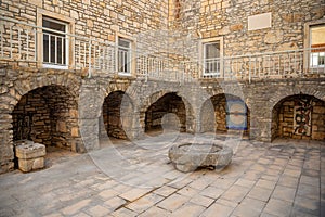 Medieval courtyard in old town of Vela Luka, Korcula island, Croatia