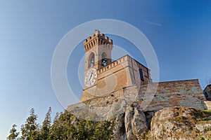 Medieval crenellated brick wall Clock tower