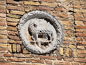Medieval crest on the city walls of Volterra, Italy