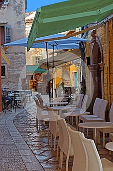 Medieval Croatian old street,with street cafe in Porec