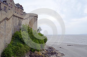 Medieval defensive wall in Mont Saint Michele in France, Normandy