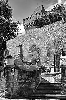 Medieval defensive wall and stone stairs at the royal castle