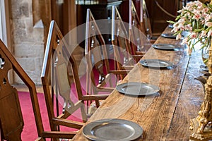 Medieval dining table and chairs. Mediaeval fraternal banqueting