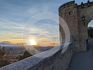 Medieval entrance and sunset photo