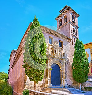 The medieval facade of San Gil and Santa Ana Church, Granada, Spain