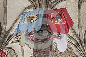 MEDIEVAL FLAGS HANG ON TOWERS