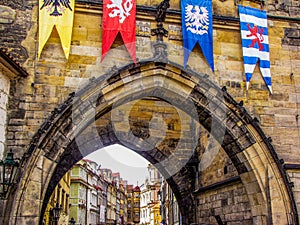 Medieval flags of Old Town bridge tower, Charles Bridge, Prague, Czech Republic