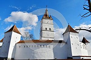 Medieval fortified white-walled church Harman
