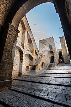 Medieval fortress. Arch and climb stairs. Italian historic architecture.