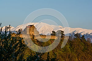 Medieval fortress in Transylvania with the Carpathians in the background