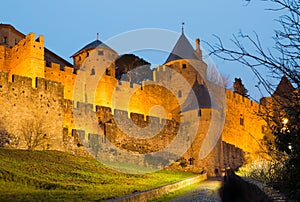 Medieval fortress walls in evening time. Carcassonne