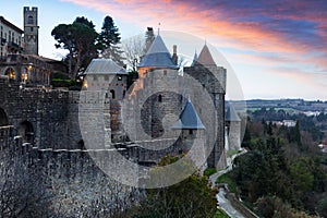 Medieval fortress walls in twilight time. Carcassonne
