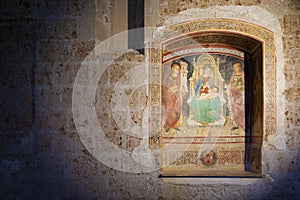 Medieval fresco in small church of Sovana, Italy