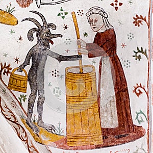 Středověký freska z žena chrlit máslo ďábel 