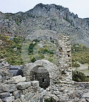 The medieval Funa Fortress, located on a rocky hill at the foot of the South Demerdzhi Mountain