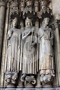 Medieval gothic statues on entry to Eglise St. Germain l`Auxerrois in Paris