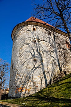 Medieval gothic town fortification, fortress, old stronghold, antique masonry, renaissance historical buildings, stone city walls