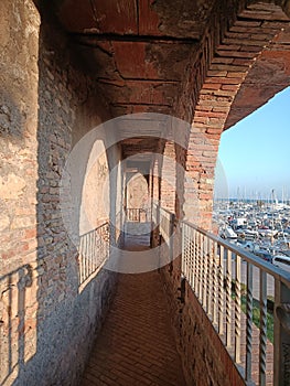 medieval hallway with balcony at the afternoons