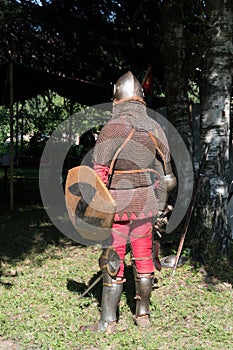 Medieval historical re-enactment with man in armor