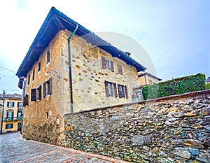 The medieval house in small village Gentilino, Collina d\'Oro, Switzerland photo