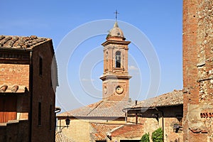 Medieval houses and bell tower in Montepulciano, Italy