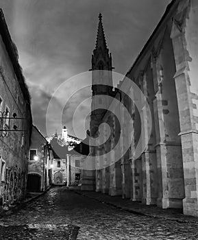 Medieval houses, Convent of the Order of St Clare Nuns Poor Clares on Farska street right and Castle on hill, Bratislava