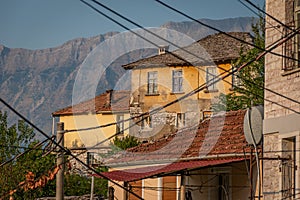 Medieval houses surrounded by mountains in Gjirokaster, Albania