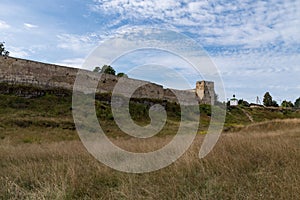 Medieval Izborsk fortress wall,  Talavskaya tower and Chapel of the Korsun Icon of the Mother of God. Izborsk, Pskov region,