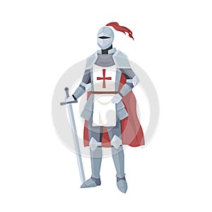 Medieval knight in armor, red cape and helmet with feather. Warrior of Middle Ages standing and leaning on a sword