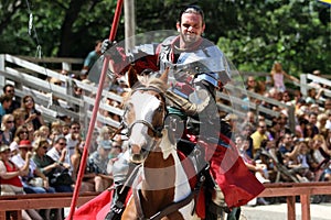 Medieval knight demonstrate skills on horseback