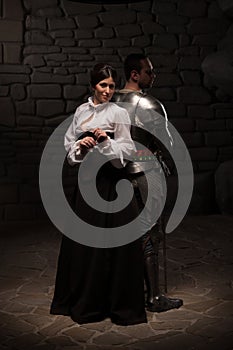Medieval knight and lady posing