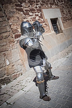 Medieval knight with metal armor s.XIV. Reenactment photo