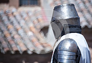 Medieval knight with metal helmet