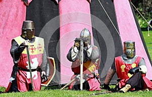 medieval Knights sitting in front of a tent