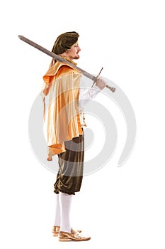 Medieval man knight with long hair and sword