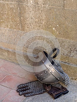 Medieval, mediaeval knight helmet and chain mail gloves.