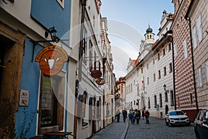 Medieval narrow street with colorful renaissance historical buildings, Former Jesuit college now Hotel Rose in the center of Cesky