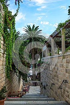 Medieval narrow street in old town of Hvar in Croatia