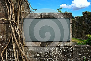 Medieval old plate on stone wall