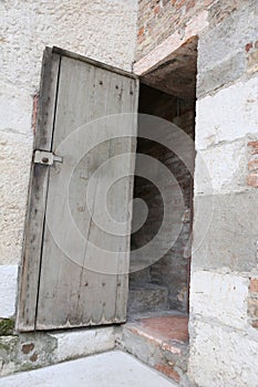 old wooden door of bell tower